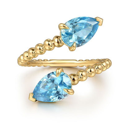 14K Yellow Gold Bujukan Blue Topaz Bypass Ladies Ring