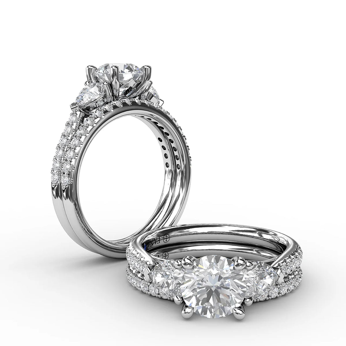 Elegant Pear Sidestone Ring in Sapphire