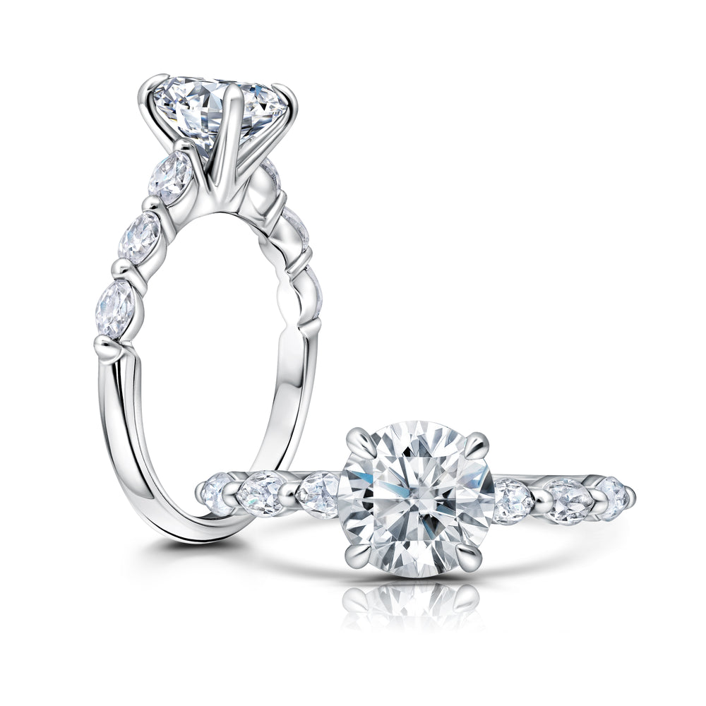 Dainty setting with Marquise side Diamonds set with single prongs