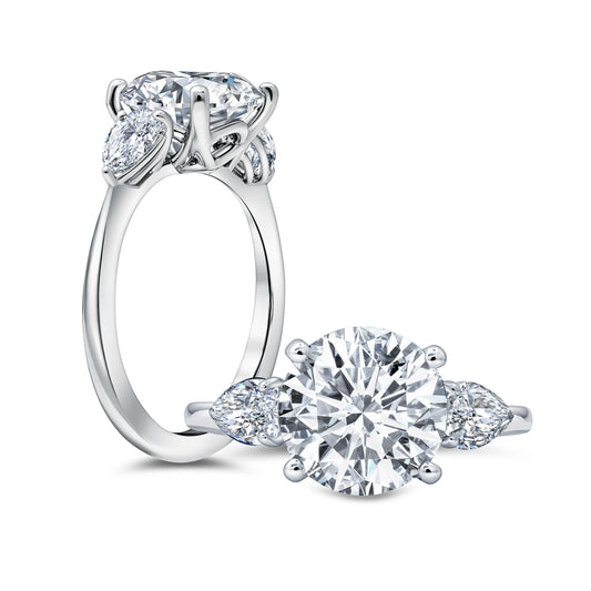 Three stone pear ring