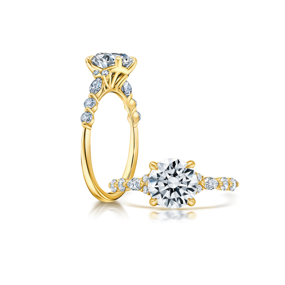 Marquise and Round Diamonds alternating pattern set with single prongs