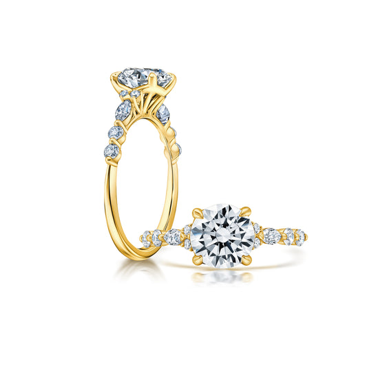 Marquise and Round Diamonds alternating pattern set with single prongs
