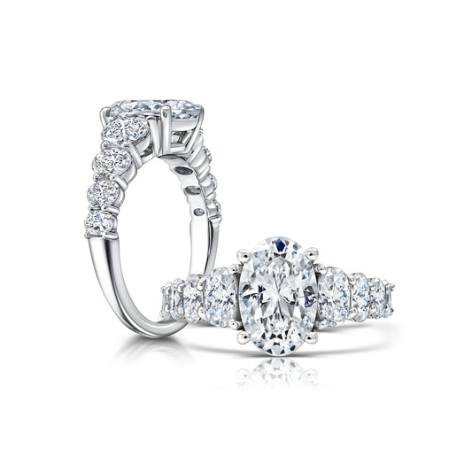 Perfectly matched Oval Diamonds graduating down the sides of the center Diamond